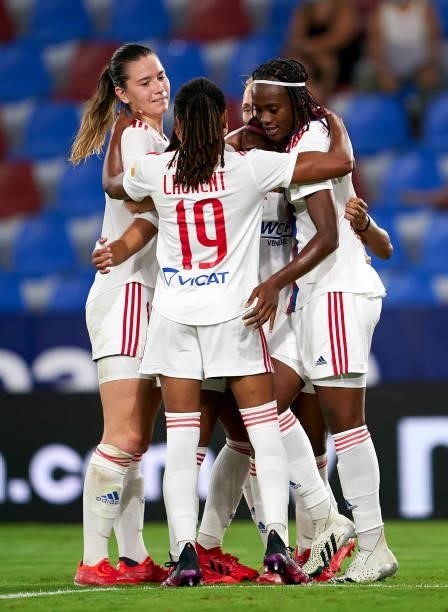 Melvine Malard of Lyon celebrates after scoring her team's first goal with her teammates during UEFA Women's Champions League Round 2 match between...