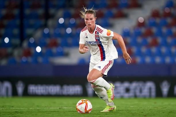 Amandine Henry of Lyon runs with the ball during UEFA Women's Champions League Round 2 match between Levante UD and Lyon at Ciutat de Valencia on...