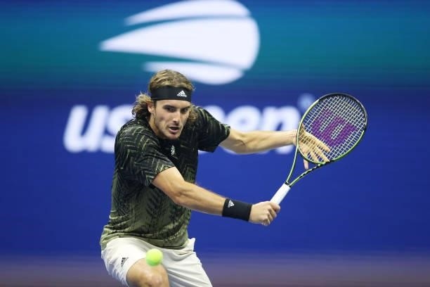 Stefanos Tsitsipas of Greece returns the ball against Adrian Mannarino of France during his Men's Singles second round match on Day Three of the 2021...