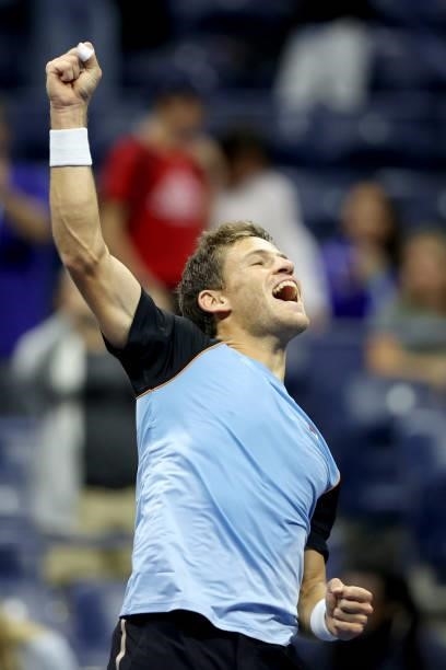 Diego Schwartzman of Argentina celebrates his win against Kevin Anderson of South Africa during his Men's Singles second round match on Day Three of...