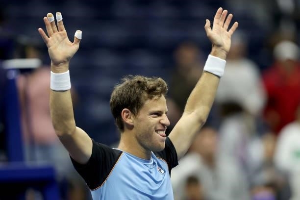 Diego Schwartzman of Argentina celebrates his win against Kevin Anderson of South Africa during his Men's Singles second round match on Day Three of...