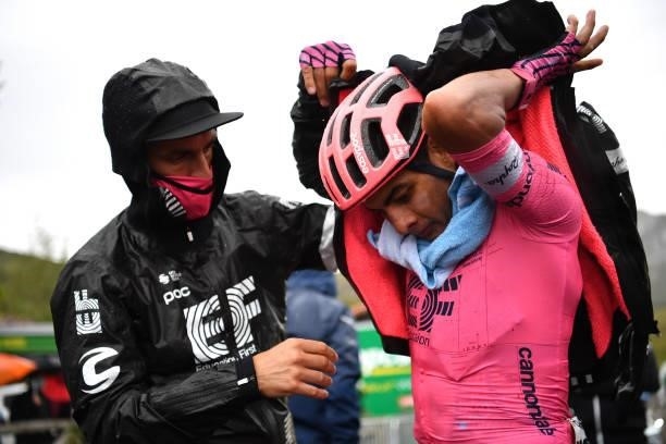 Diego Andres Camargo Pineda of Colombia and team EF Education - Nippo assisted by a Team soigneur at finish line during the 76th Tour of Spain 2021,...