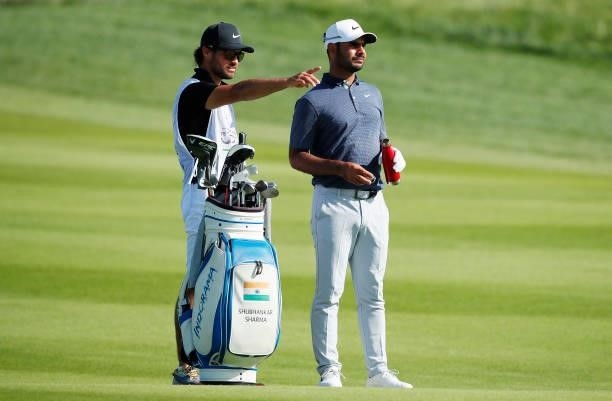 Shubhankar Sharma of India speaks to his caddie during Day One of The Italian Open at Marco Simone Golf Club on September 02, 2021 in Rome, Italy.