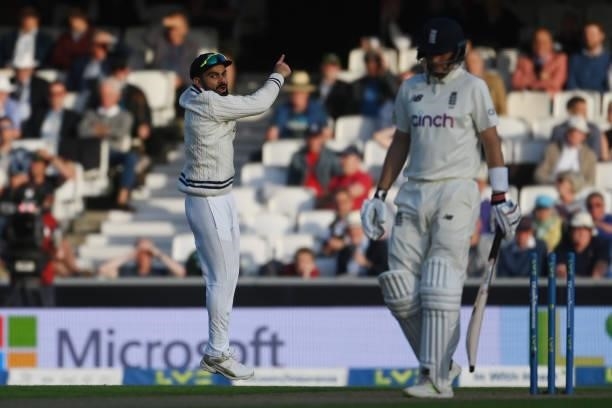 Virat Kohli of India celebrates the wicket of Joe Root of England during the Fourth LV= Insurance Test Match: Day One between England and India at...