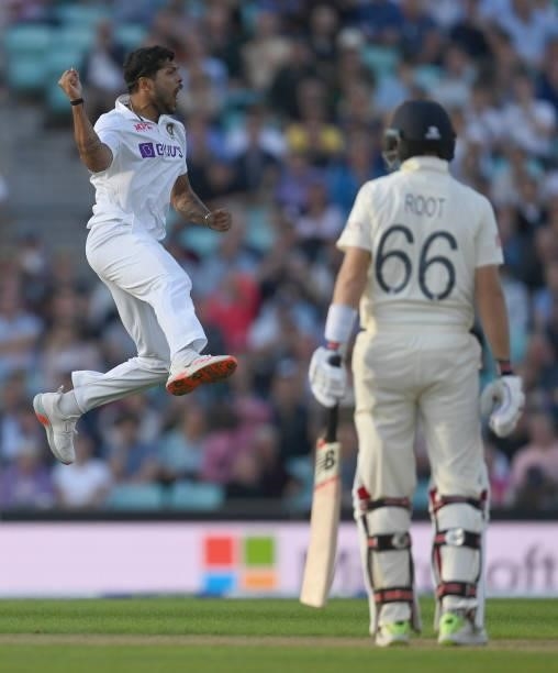 Umesh Yadav of India celebrates after bowling Joe Root of England during the 4th LV= Test Match between England and India at The Kia Oval on...