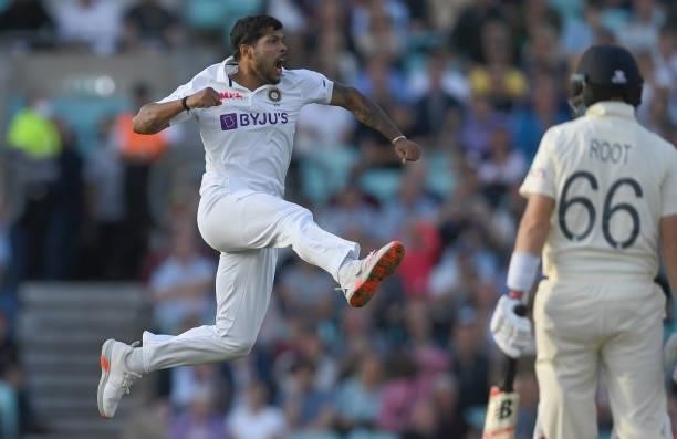 Umesh Yadav of India celebrates after bowling Joe Root of England during the 4th LV= Test Match between England and India at The Kia Oval on...