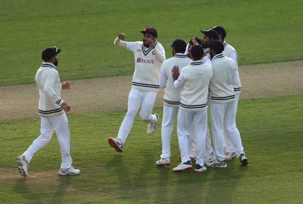 India celebrate Umesh Yadav of India's wicket of Joe Root of England during day one at The Kia Oval on September 02, 2021 in London, England.