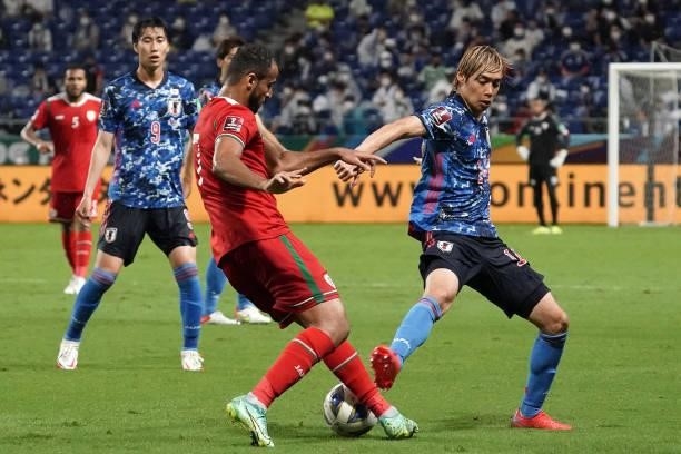 Junya Ito of Japan in action during FIFA World Cup Asian Qualifier Final Round Group B match between Japan and Oman at Panasonic Stadium Suita on...