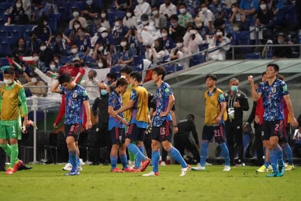 Players of Japan show dejection after FIFA World Cup Asian Qualifier Final Round Group B match between Japan and Oman at Panasonic Stadium Suita on...