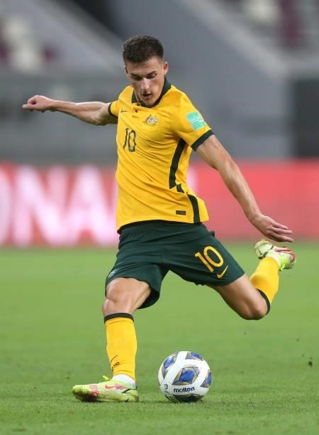 Ajdin Hrustic of Australia strikes the ball during the 2022 FIFA World Cup Qualifier match between Australia and China PR at Khalifa International...
