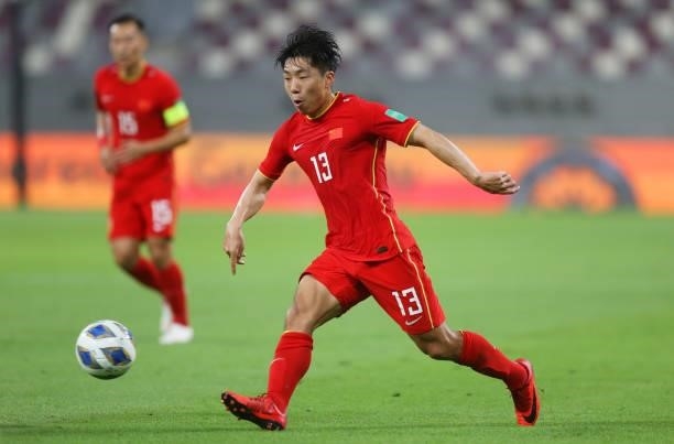 Jin Jingdao of China PR runs with the ball during the 2022 FIFA World Cup Qualifier match between Australia and China PR at Khalifa International...