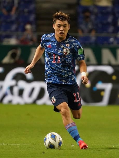 Ritsu Doan of Japan in action during FIFA World Cup Asian Qualifier Final Round Group B match between Japan and Oman at Panasonic Stadium Suita on...
