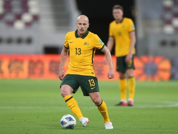 Aaron Mooy of Australia runs with the ball during the 2022 FIFA World Cup Qualifier match between Australia and China PR at Khalifa International...