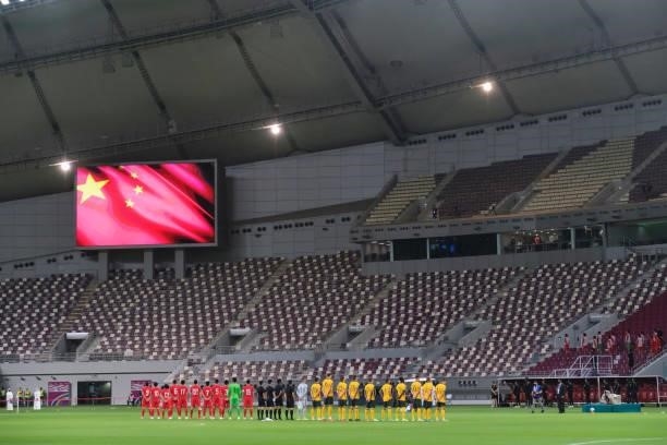 China sing the national anthem before Australia v China PR - 2022 FIFA World Cup Qualifier at Khalifa International Stadium on September 02, 2021 in...