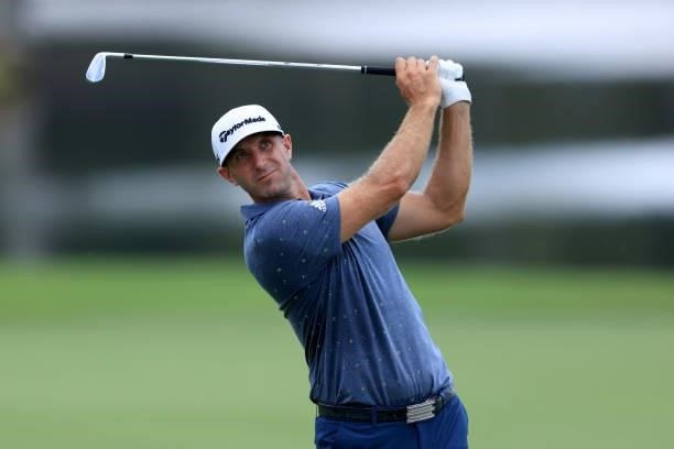 Dustin Johnson plays a shot on the eighth hole during the first round of the TOUR Championship at East Lake Golf Club on September 02, 2021 in...