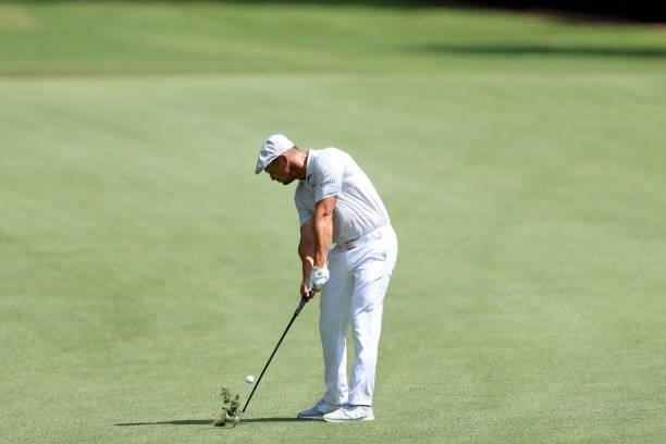 Bryson DeChambeau plays a shot on the seventh hole during the first round of the TOUR Championship at East Lake Golf Club on September 02, 2021 in...
