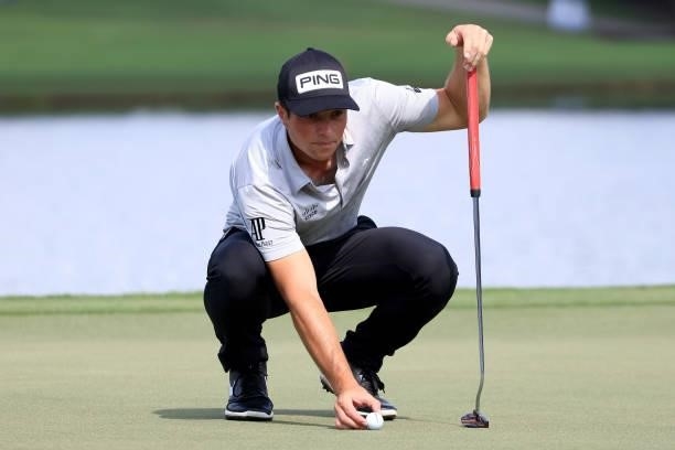 Viktor Hovland of Norway plays a shot on the 15th hole during the first round of the TOUR Championship at East Lake Golf Club on September 02, 2021...