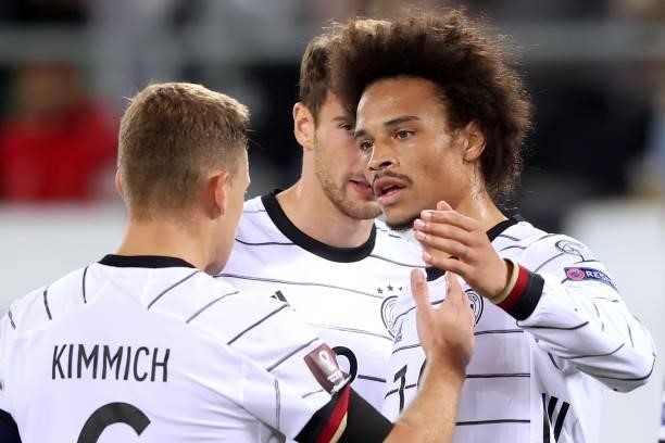 Leroy Sane of Germany celebrates scoring the 2nd team goal with team, mate Joshua Kimmich during the 2022 FIFA World Cup Qualifier match between...