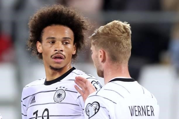 Leroy Sane of Germany celebrates scoring the 2nd team goal with team mate Timo Werner during the 2022 FIFA World Cup Qualifier match between...