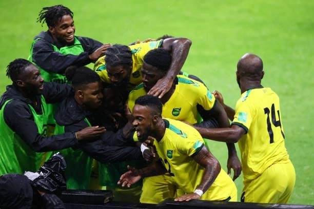 Shamar Nicholson of Jamaica celebrates with teammates after scoring his team's first goal during the match between Mexico and Jamaica as part of the...