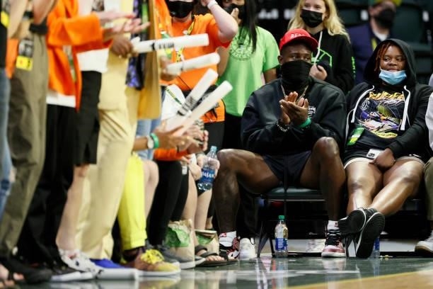 Metcalf of the Seattle Seahawks watches the fourth quarter of a game between the Seattle Storm and the New York Liberty at Angel of the Winds Arena...
