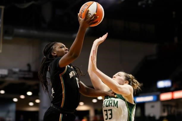 Michaela Onyenwere of the New York Liberty shoots against Katie Lou Samuelson of the Seattle Storm during the fourth quarter at Angel of the Winds...