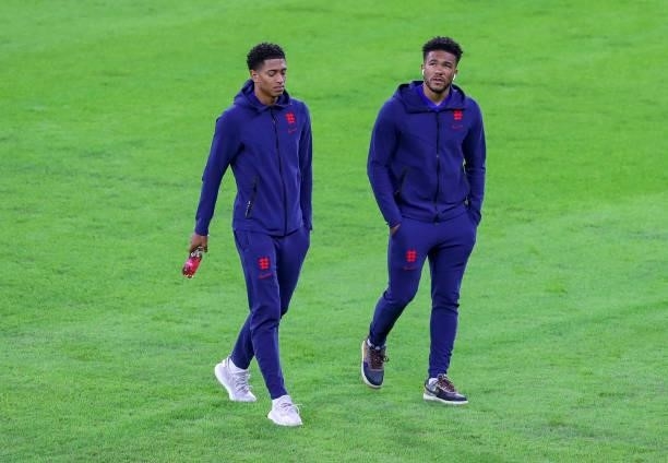 Jude Bellingham and Tyrone Mings inspect the pitch before the 2022 FIFA World Cup Qualifiers match between Hungary and England at Stadium Puskas...