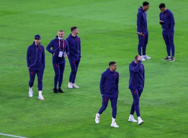 England platers inspect the pitch before the 2022 FIFA World Cup Qualifiers match between Hungary and England at Stadium Puskas Ferenc on September...