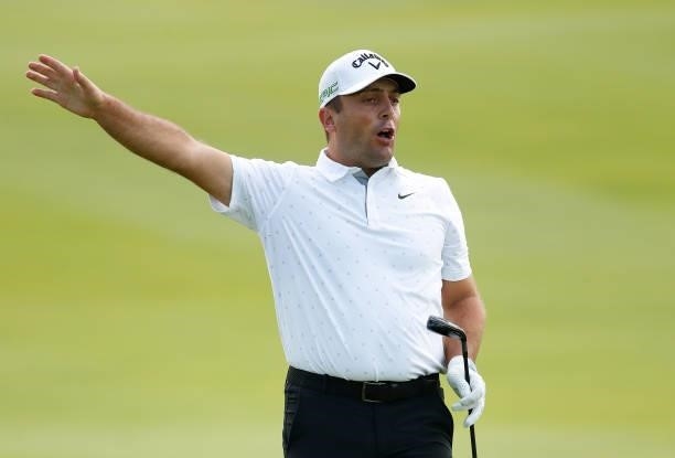 Francesco Molinari of Italy shouts fore after hitting his second shot on the 18th hole during Day Two of The Italian Open at Marco Simone Golf Club...
