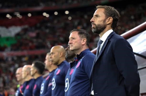 Gareth Southgate, Head Coach of England and coaching staff look on prior to the 2022 FIFA World Cup Qualifier match between Hungary and England at...