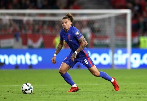 Kalvin Phillips of England runs with the ball during the 2022 FIFA World Cup Qualifier match between Hungary and England at Stadium Puskas Ferenc on...