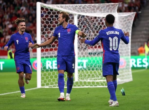Harry Kane of England celebrates with teammates after scoring their team's second goal during the 2022 FIFA World Cup Qualifier match between Hungary...