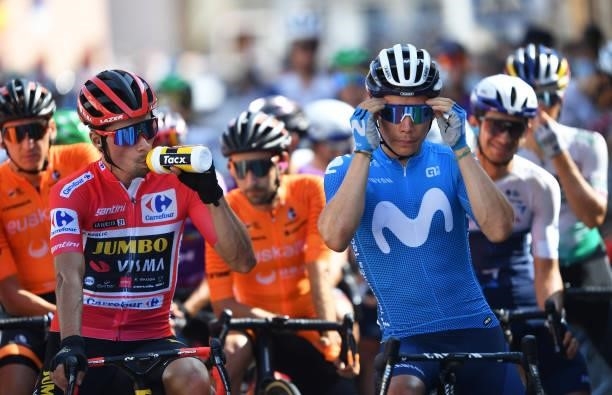 Primoz Roglic of Slovenia and Team Jumbo - Visma and Miguel Ángel López Moreno of Colombia and Movistar Team prepare for the race prior to the 76th...