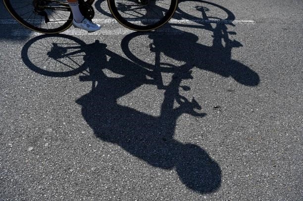 Detail view of the shadow of a rider during the 76th Tour of Spain 2021, Stage 19 a 191,2 km stage from Tapia to Monforte de Lemos / @lavuelta /...