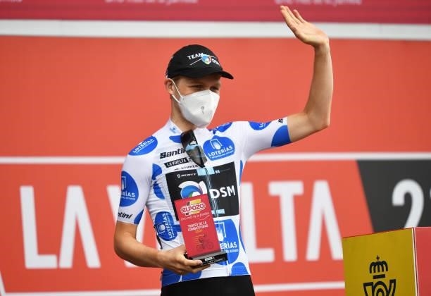 Michael Storer of Australia and Team DSM polka dot mountain jersey receives most combative rider trophy during the team presentation prior to the...