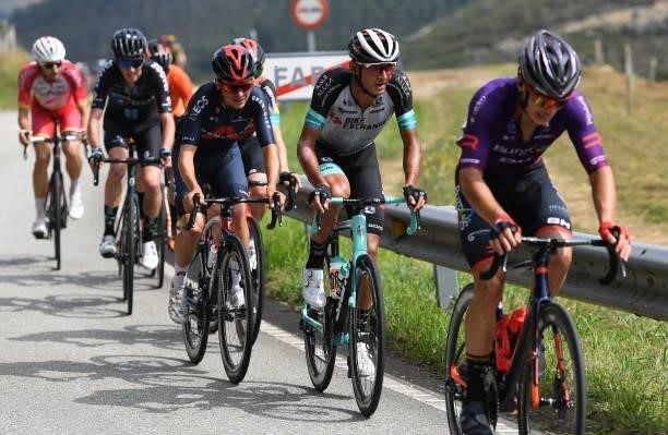 Thomas Pidcock of United Kingdom and Team INEOS Grenadiers and Andrey Zeits of Kazahkstan and Team BikeExchange compete in the breakaway during the...