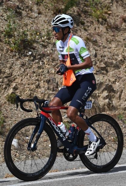 Egan Arley Bernal Gomez of Colombia and Team INEOS Grenadiers white best young jersey competes and carrying the feed for his teammates during the...