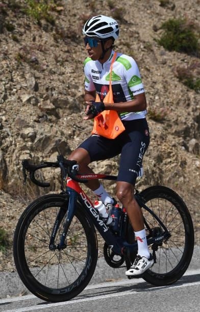 Egan Arley Bernal Gomez of Colombia and Team INEOS Grenadiers white best young jersey competes and carrying the feed for his teammates during the...