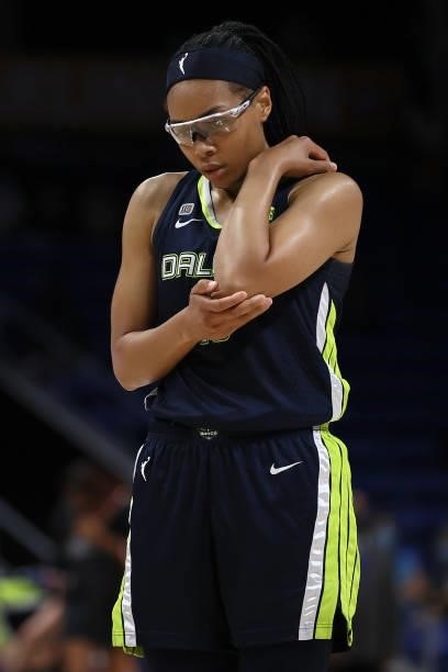 Guard Allisha Gray of the Dallas Wings reacts after being fouled by forward Monique Billings of the Atlanta Dream in the second half at College Park...