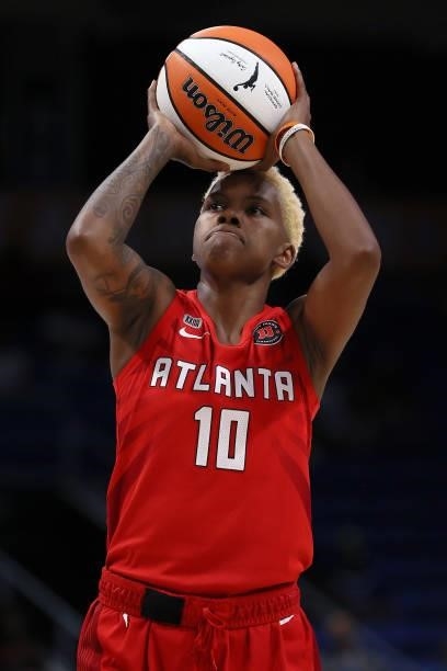 Guard Courtney Williams of the Atlanta Dream shoots a free throw against the Dallas Wings in the first half at College Park Center on September 02,...
