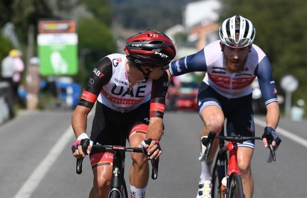 Rui Oliveira of Portugal and UAE Team Emirates and Quinn Simmons of United States and Team Trek - Segafredo compete in the breakaway during the 76th...