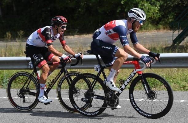 Rui Oliveira of Portugal and UAE Team Emirates and Quinn Simmons of United States and Team Trek - Segafredo compete in the breakaway during the 76th...