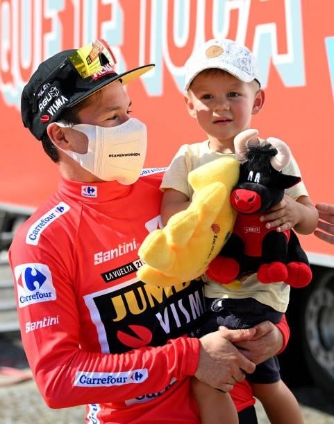Primoz Roglic of Slovenia and Team Jumbo - Visma red leader jersey celebrates with his son Levom after the 76th Tour of Spain 2021, Stage 19 a 191,2...
