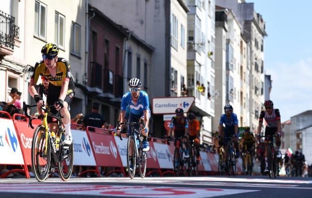 Nathan Van Hooydonck of Belgium and Team Jumbo - Visma and Jose Joaquin Rojas Gil of Spain and Movistar Team cross the finishing line during the 76th...