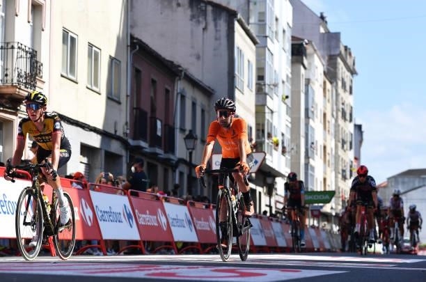 Koen Bouwman of Netherlands and Team Jumbo - Visma and Mikel Bizkarra Etxegibel of Spain and Team Euskaltel - Euskadi cross the finishing line during...