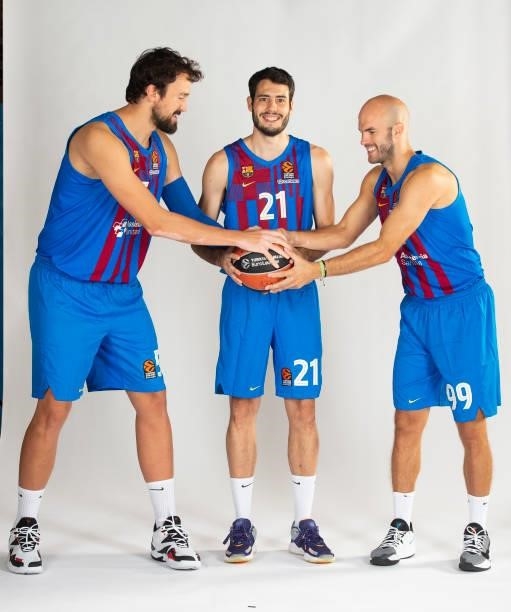 Sertac Sanli, #5; Alex Abrines, #21and Nick Calathes, #99 poses during the 2021/2022 Turkish Airlines EuroLeague Media Day of FC Barcelona at Ciutat...