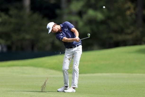 Harris English plays a shot on the seventh hole during the second round of the TOUR Championship at East Lake Golf Club on September 03, 2021 in...
