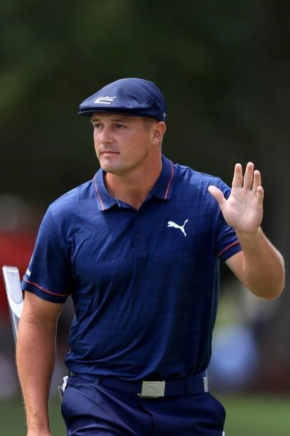 Bryson DeChambeau acknowledges the crowd on the first hole hole during the second round of the TOUR Championship at East Lake Golf Club on September...