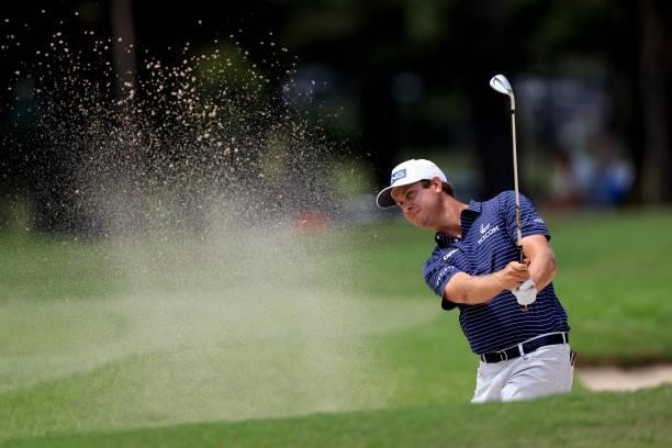 Harris English plays a shot on the first hole during the second round of the TOUR Championship at East Lake Golf Club on September 03, 2021 in...