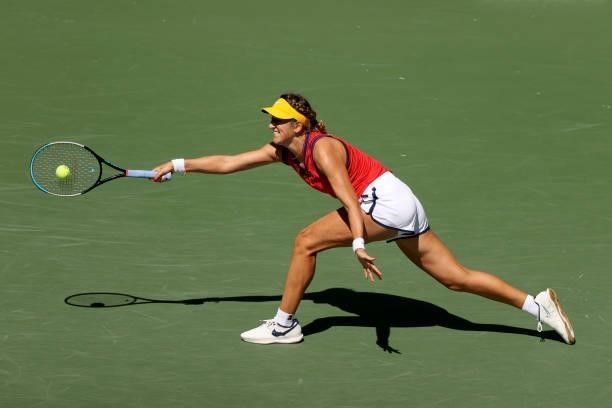 Victoria Azarenka of Belarus stretches for a ball against Garbine Muguruza of Spain during her Women's Singles third round match on Day Five at USTA...